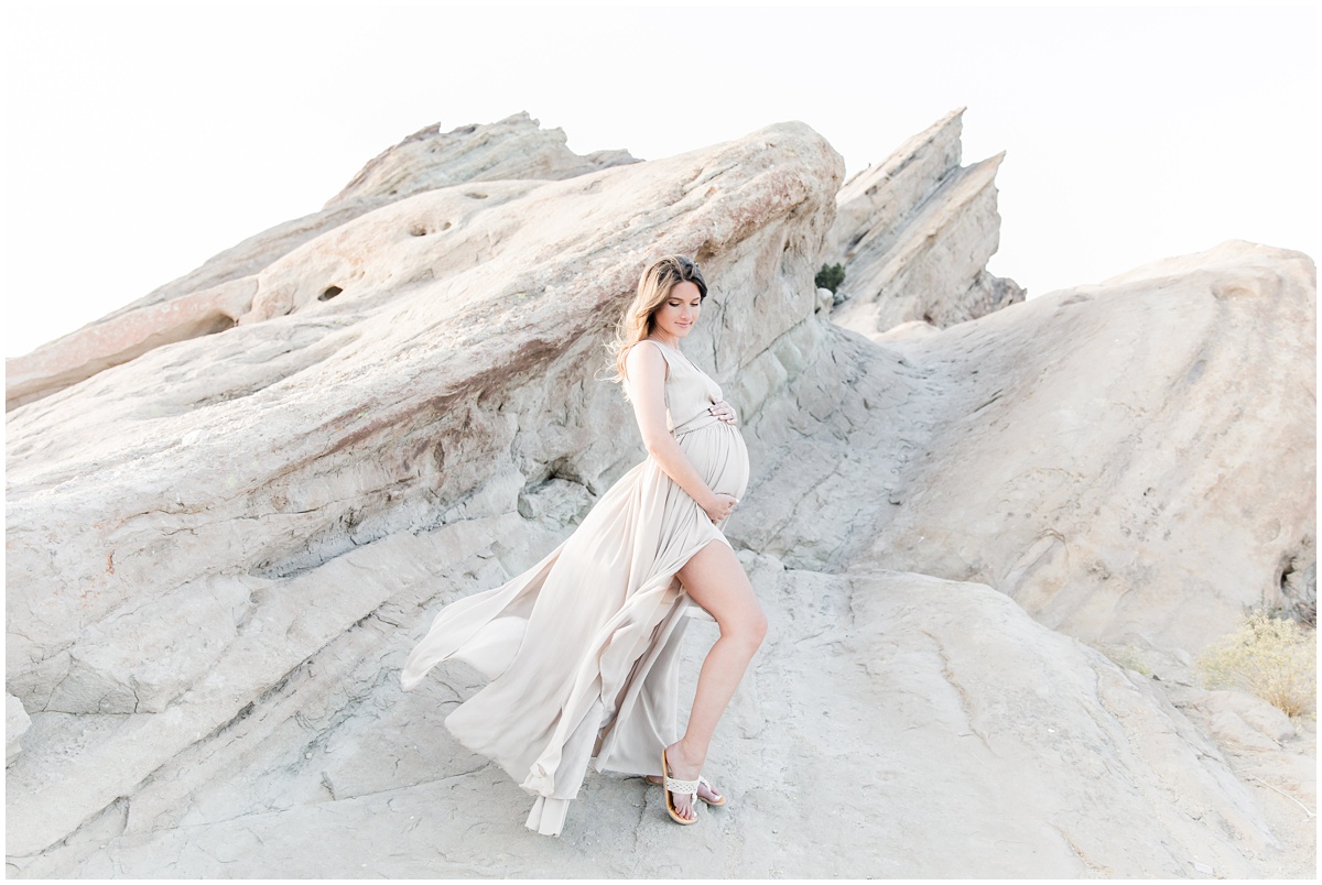 Stunning mommy to be in flowing maternity dress | Vasquez Rocks maternity session by Los Angeles photographers Peter & Bridgette